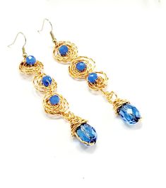 These Blue Long Drop Stone Earrings And Crystal Drop Are Spectacularly Adorable, they are uniquely elaborated strictly with high quality standards, detailed by hand we take the time to make each piece of jewelry with good and delicate finishes for these earrings are used in gold filled wire and Also, a heartfelt heartbeat that makes the unique touch we recommend these guests if you want to be unique in that party they will make you look elegant and beautiful For its development we use wire gold Spiral Wire Wrapped Earrings For Party, Wire Wrapped Spiral Earrings For Parties, Party Spiral Wire Wrapped Earrings, Teardrop Earrings Wedding, Extra Long Earrings, Long Bridal Earrings, Twist Earrings, Turquoise Hoop Earrings, Crystal Bridal Earrings