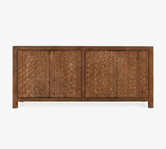 the sideboard is made out of wood and has two doors that are open to reveal an intricate pattern