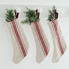 Our Red Stripe Grain Sack Stockings, Set of Three looks so charming whether you're Christmas style is French Country, Vintage Farmhouse, or classic Nordic style. This set of three mini stockings offers an old-fashioned look, inspired by French grain sacks. 100% Cotton. Set of Three. French Country Cottage Christmas, French Country Christmas Decor, Drop Cloth Projects, French Country Christmas, Vintage Christmas Stockings, Farmhouse Style Christmas, Mini Stockings, Farmhouse Fabric, Vintage Stockings