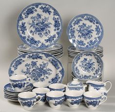 a collection of blue and white china