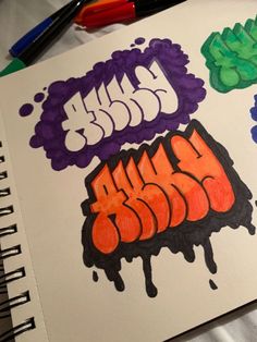 a notebook with some graffiti on it