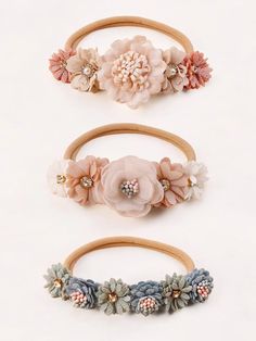 Add a touch of elegance to your little one's hairstyle with our 3-Piece Ivory-Colored Craft Flower & Rhinestone Decorated Seamless Elastic Hair Ties. Perfect for baby girls, these adorable hair ties feature delicate craft flowers and sparkling rhinestones, providing a stylish and comfortable way to keep hair in place. Ideal for any occasion, your baby girl will look charming and feel comfortable all day long. Cute Adjustable Headband For Wedding, Cute Adjustable Headband For Weddings, Cute Adjustable Flower Headband, Adjustable Handmade Flower Hair Accessories For Gift, Cute Adjustable Hair Accessories With Handmade Flowers, Adjustable Hair Accessories With Handmade Flowers For Gifts, Cute Handmade Flower Headband, Cute Adjustable Cream Hair Accessories, Cute Pink Flower Headband