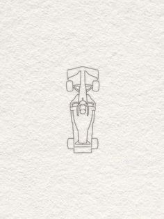 an image of a drawing of a race car on white paper with the outline drawn