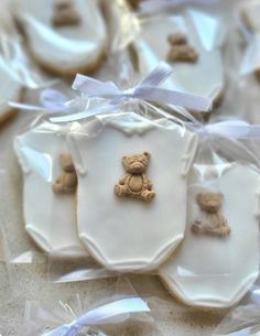 some cookies with teddy bears on them in plastic bags