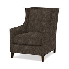 the arm chair is upholstered with dark brown fabric