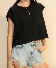 Oversized cropped muscle tee, crew neck with pocket in black. -100% Cotton Black Streetwear Top With Side Pockets, Black Tops With Side Pockets For Streetwear, Black Boxy Cropped T-shirt With Crew Neck, Black Boxy Fit Cropped T-shirt, Black Boxy Cropped T-shirt, Black Cropped T-shirt With Crew Neck, Black Crew Neck Cropped T-shirt, Black Loose Fit Cropped Cotton T-shirt, Oversized Cropped T-shirt For Everyday