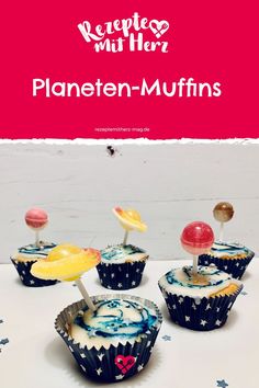 some cupcakes are sitting on a table with the words planeten muffins