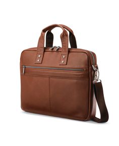 Sleek and compact, the Slim Brief is perfect for business and beyond. With a fully padded main compartment, additional organization in the front pocket, and detachable strap, the Slim Brief is ready to go wherever you do. Business Brown Tote Luggage, Brown Business Tote Luggage, Modern Brown Tote Luggage, Classic Brown Tote Luggage, Brown Rectangular Luggage With Leather Backing, Brown Leather-backed Rectangular Luggage, Classic Brandy-colored Formal Bag, Classic Formal Bag In Brandy Color, Classic Brandy-colored Bag For Formal Occasions