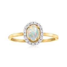 an opal and diamond ring in yellow gold