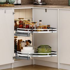 an open cabinet in the corner of a kitchen