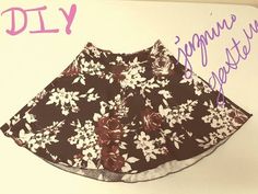 a skirt with flowers on it and the words diy written in pink above it