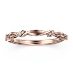 a rose gold wedding band with diamonds