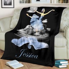 a black blanket with a woman in blue dress on it and the words fesica written