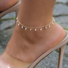 "A beautiful, and dainty freshwater pearl anklet. It's the perfect summer accessory! ~Details~ - Made of 14k Gold plated over 925 Sterling Silver (we use a thick plating, for a piece that will last year many years) - Made of freshwater pearls - Measures 9\" + 1\" Extension Chain - Lobster Clasp Closure Ships same day for quick delivery! Happy to answer any questions! :)" Summer Beach Pearl Bracelet, Adjustable White Pearl Chain Anklet, Elegant Beaded Summer Anklets, Elegant Summer Pearl Bracelet For The Beach, Elegant Summer Pearl Bracelet For Beach, Adjustable Dainty Pearl Anklets, Delicate Pearl Chain Anklets, Elegant Spring Anklets For Gift, Elegant Spring Anklets As Gifts