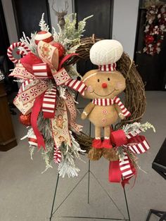 a christmas wreath with a gingerbread man on it