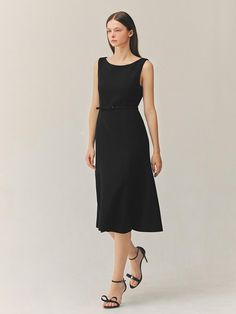 This product is a sophisticated sleeveless semi-mermaid tweed long dress that offers a classic silhouette with a contemporary twist. The dress features a fitted bodice that flares out subtly at the hem, creating a shape that is reminiscent of a mermaid's tail. The refined tweed fabric adds texture and depth to the garment, making it an excellent choice for formal events. - The semi-mermaid silhouette of the dress accentuates the body's curves while adding an element of drama to the lower skirt.- Its sleeveless design allows for elegant accessorizing with items such as necklaces or boleros.- The tweed fabric brings a timeless elegance to the dress, suitable for various upscale occasions.- A well-defined waistline, enhanced by a simple belt, creates a flattering profile that is both gra Elements Of Drama, Simple Belt, Body Curves, Mermaid Silhouette, Tweed Fabric, Mermaid Tail, Classic Silhouette, Fitted Bodice, Formal Event