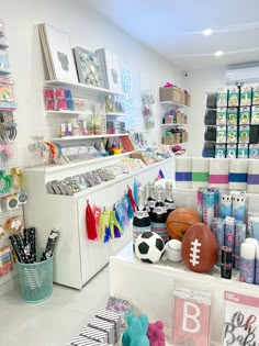 a sports themed shop with lots of items on the counter and in front of it