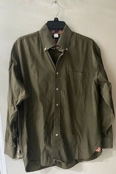 Men's Tommy Hilfiger Long Sleeve Button Down Shirt Olive Green Size Large. Tommy Hilfiger Button-up Tops, Tommy Hilfiger Cotton Button-up Shirt, Tommy Hilfiger Casual Button-up Shirt, Tommy Hilfiger Classic Shirt With Button Closure, Classic Tommy Hilfiger Shirt With Button Closure, Casual Tommy Hilfiger Tops With Buttons, Tommy Hilfiger Collared Top With Button Closure, Tommy Hilfiger Casual Shirt With Buttons, Tommy Hilfiger Long Sleeve