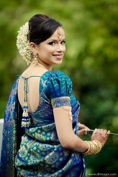 South Indian bride. Temple jewelry. Jhumkis.Blue silk kanchipuram sari.Braid with fresh flowers. Tamil bride. Telugu bride. Kannada bride. Hindu bride. Malayalee bride.Kerala bride.South Indian wedding. Traditional Blouse Designs, Blouse Back Neck Designs, Blouse Design Images, Blouse Designs Indian, Back Neck Designs