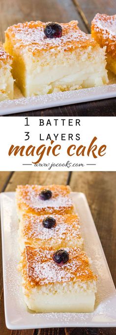 three layers of magic cake with blueberries on top