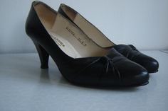 "Shoes are in very good condition. They have been made in Yugoslavia by \"Beograd Centrotextil\" in early 70's, the period which assures great quality. Thick black leather and leather covered heel. Very elegant. Length (sole): 25.5cm or 7in Height (heel): 7cm or 2.7in By purchasing this item you agree to QooQooSVintage shop policies, so please read them: https://www.etsy.com/your/shops/QooQooSVintage/policies ." Vintage Black Leather Shoes, Vintage Black Leather Shoes For Work, Retro Leather Court Shoes For Evening, Vintage Leather Shoes For Galas, Retro Black Leather Court Shoes, Black Retro Leather Court Shoes, Black Retro Court Shoes For Formal Occasions, Retro Black Formal Court Shoes, Vintage Black Leather Court Shoes