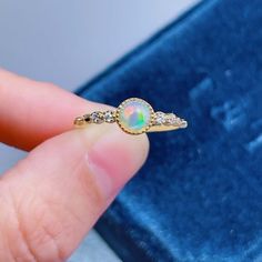 Natural Opal Ring | Sterling Silver Opal Ring | Stack Opal Ring | Antique Opal Ring Opal Engagement Ring | Genuine Opal Ring | Raw Opal Birthstone Ring | Promise Ring for Her.>>>> BASIC INFORMATION <<<< Stone type: Natural good fire opal.Round Opal Size: 5*5mm.Material: 925 Sterling Silver +Natural opal stone + Shining CZ diamond.>>>>ABOUT BAND COLOR<<<>>> SIMPLE DESIGN AND GOOD FIRE <<<>>> CUSTOM METALS <<<< Rin Round Opal Ring For Gift, Stackable Opal Promise Ring, Opal Birthstone Ring With Round Stone, Round Opal Promise Ring, Silver Opal Ring With Accent Stones For Gift, Elegant Silver Opal Ring With Round Cut, Silver Opal Ring For Promise - Fine Jewelry, Elegant Silver Opal Ring With Accent Stones, Fine Jewelry Opal Crystal Ring