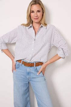 Contrasting stripes add a fun detail to this elevated button-down by EVEREVE. Crafted in sustainable stretch cotton, this shirt features a classic collar, a curved hem, and a relaxed silhouette. Casual Collared Blouse With Vertical Stripes, Spring Tops With Vertical Stripes And Shirttail Hem, Classic Relaxed Fit Blouse With Vertical Stripes, Everyday Striped Collared Shirt, Classic Blouse With Vertical Stripes And Relaxed Fit, Striped Shirt For Everyday In Fall, Striped Shirt For Everyday Fall Wear, Everyday Striped Shirt For Fall, Striped Collared Blouse Relaxed Fit