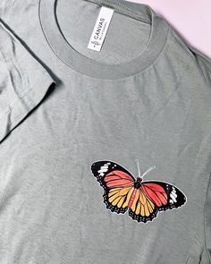 Sage green tee with monarch butterfly pocket sized design Design is screen printed Shirt is 100% cotton Green Tee, Butterfly Shirts, Screen Printing Shirts, Monarch Butterfly, Gifts For Pet Lovers, Womens Clothing Tops, Screen Printing, Labour Day, Art Collection