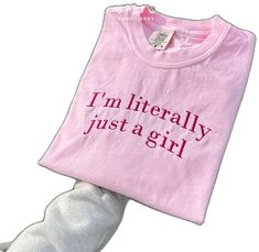 Pink Cotton Tops With Letter Print, Trendy Long Sleeve T-shirt With Embroidered Text, Cute Pink Shirt For Streetwear, Cute Pink Tops With Funny Text, Trendy Pink Tops With Funny Text, Trendy Pink Top With Funny Text, Pink Tops With Funny Text For Spring, Cute Cotton Tops With Embroidered Text, Trendy Cotton Shirt With Funny Text