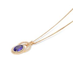 Gracefully curving and layering, this sparkling woven tanzanite pendant elevates her attire. Crafted in precious two tone 18K rose and yellow gold, this shimmering style features an exquisite oval cut tanzanite wrapped in a pave-lined white diamond halo. The embellished ribbons surrounding the center gemstone are uniquely designed creating a sophisticated and modern sparkling look. Surprise your loved one with this truly special gift appropriate for any occasion.
 The 7. Luxury Oval Tanzanite Necklaces, Elegant Oval Tanzanite Necklaces, Elegant Tanzanite Oval Pendant Jewelry, Elegant Tanzanite Oval Pendant Necklace, Yellow Gold Tanzanite Oval Necklace, Diamond Flower Pendant, Tanzanite Pendant, Tanzanite Stone, Pave Pendant