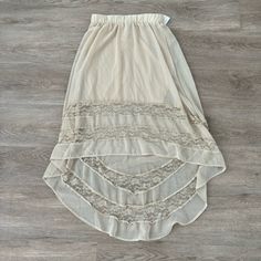 Nwt. Elastic Waist. Color Is A Light Tan. Chic Lace Maxi Skirt For Summer, Spring Sheer Maxi Skirt, Sheer Beige Bottoms For Summer, Chic Spring Maxi Skirt With Lace Trim, Sheer Beige Bottoms For Spring, Sheer Lace Skirt For Spring, Sheer Maxi Skirt For Spring, Casual Sheer Skirt For Spring, Spring Chiffon Skirt With Sheer Details