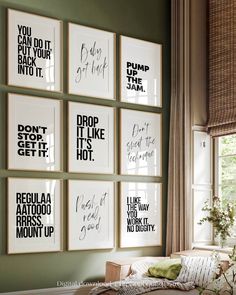 six black and white prints on the wall above a bed in a room with green walls