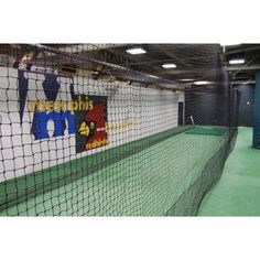 an indoor batting cage in a sports facility