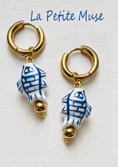 Blue and White Gold Hand Painted Santorini Inspired Porcelain Dangle Gold Hoop Earrings   Summer Vacation Jewelry Hoop earrings Porcelain Earrings. 14K Gold Filled High Quality , Sold as PAIR Made to Order| Anti Tarnish Metal | Waterproof  * Materials: High Quality 14K Gold Filled Stainless Steel and Ceramic Hand Made Painted Beads * Sold as PAIR * Closure: Latch  * Gold Hoop Dimensions: 1/2" x 1/2" * Nickel Free & Lightweight, anti Tarnish , will not change color when wet  We take customer care Blue Nickel-free Gold-plated Earrings, Nickel Free Blue Gold Plated Earrings, Blue Nickel Free Gold Plated Earrings, Blue Hoop Earrings Gold Plated, Blue 14k Gold-filled Earrings, Handmade Blue 14k Gold-filled Earrings, Handmade Blue 14k Gold Filled Earrings, Handmade 14k Gold Filled Blue Earrings, Handmade Blue Huggie Earrings