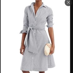 Brand New With Tags, Size 12, J Crew Shirt Dress In Pinstripe Navy And White. Classic Beauty. Great On Its Own Or With A Sweater Or Blazer. Button Front, Wide Tie Belt. Waist 15.5”; Bust 19.5”; Length From Shoulder 40”. Has A Little Stretch With The 2% Elastane. Never Worn. Only Tried On And Pressed. Added A Few More Photos. Looks So Much Better On The Dress For Than Hanging! Classic Striped Long Sleeve Shirt Dress, Classic Striped Shirt Dress, Classic Striped Shirt Dress For Work, Striped Long Sleeve Shirt Dress For Formal Occasions, Classic Workwear Dress With Striped Collar, Elegant Striped Shirt Dress For Daywear, Spring Vertical Stripes Shirt Dress For Work, Button-up Shirt Dress With Striped Collar For Work, Spring Vertical Stripes Workwear Shirt Dress