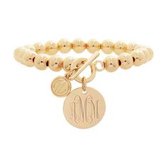 Check out this monogrammed bracelet with a 7/8 inch monogrammed charm and fun beads! This bracelet is perfect for those casual days or a dressy night on the town! The bracelet stretches to fit almost any wrist, so it makes a perfect personalized gift idea for all the special women in your life!​Made of brassNickel Free Top Jewelry Trends, Monogramed Gifts, Monogram Bracelet, Night On The Town, Moms Bracelet, Fine Silver Jewelry, Dope Jewelry, Ball Bracelet, Monogram Jewelry