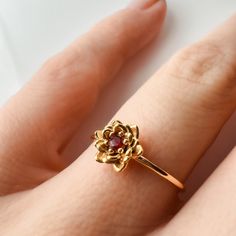 Flower Ruby Ring, Solitaire Ruby Ring For Promise, Gold Ruby Flower Ring Gift, Gold Ruby Flower Ring As Gift, Fine Jewelry Birthstone Flower Promise Ring, Promise Ruby Birthstone Ring In Fine Jewelry Style, Yellow Gold Ruby Flower Ring For Anniversary, Ruby Birthstone Ring For Promise, Promise Lab-created Ruby Birthstone Ring