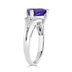 9x9 Violetish Blue AAAA Tanzanite Ring Trillion shape 2.78 ct with 0.07 cttw Diamond in 14K White Gold Product Information SKU TTR0001/3 Metal Type 14K Metal Color White Gold Ring Style Solitaire Primary Stone Gemstone Name Tanzanite Gemstone Species Zoisite No. Of Gemstones 1 Gemstone Shape Trillion Gemstone Weight 2.78 Gemstone Size 9x9 Origin Tanzania Secondary Stone Gemstone Name Diamond Gemstone Species Diamond No. Of Gemstones 19 Gemstone Shape Round Gemstone Weight 0.07 Gemstone Size - Or Tanzanite Trillion Cut Ring For Anniversary, Trillion Tanzanite Ring, Brilliant Cut Tanzanite Diamond Ring In White Gold, Trillion Cut Tanzanite White Gold Jewelry, Classic Tanzanite Jewelry In Trillion Cut, Tanzanite Ring, Tanzanite Gemstone, 14k White Gold Ring, White Gold Ring