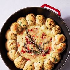 a pot filled with food on top of a table