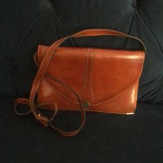 Bally Vintage Shoulder Bag Navy Leather . Condition Is Pre-Owned. Over All Good Condition. May Be Carried A Clutch Or Worn As Shoulder Bag Or Crossbody. 10” L X 7”H X 4” D Strap Drop 21” Formal Tan Crossbody Bag, Cognac Crossbody Shoulder Bag For Evening, Evening Cognac Crossbody Shoulder Bag, Cognac Shoulder Bag For Evening, Vintage Crossbody Flap Bag With Removable Pouch, Vintage Brown Flap Bag For Evening, Brown Vintage Flap Bag For Evening, Vintage Brown Evening Flap Bag, Vintage Evening Bags With Adjustable Strap