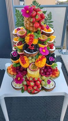 there is a very large display of fruit on the table