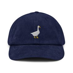 A hat made of corduroy? That's a yes! Get your hands on a hat that'll serve you for ages. The corduroy fabric has stood the test of time thanks to its best features--softness, affordability, and durability.  This goose hat is perfect for any time of year or gifts! * 100% cotton corduroy * Soft, unstructured crown * Cotton twill sweatband and taping * Adjustable buckle This product is made especially for you as soon as you place an order, which is why it takes us a bit longer to deliver it to you. Making products on demand instead of in bulk helps reduce overproduction, so thank you for making thoughtful purchasing decisions! Corduroy Hat With Embroidered Logo And Curved Brim, One Size Corduroy Cap, Adjustable Corduroy Hat With Embroidered Logo, Corduroy Hat With Curved Brim, Adjustable Corduroy Hat With Curved Brim, Goose Hat, Embroidered Corduroy, Corduroy Cap, Corduroy Hat