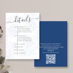 a blue and white wedding card with the word details printed on it next to a bouquet of flowers