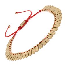 Fish Scale Red & Gold Cord Bracelet is a unique accessory that brings a distinctive touch to your style. Featuring 18k gold-plated fish scale-inspired charms strung along a vibrant red cord, this bracelet is designed to make a statement. The combination of the striking red cord and shimmering gold accents creates a bold and elegant look. Perfect for wearing alone or layering with other bracelets, it adds a unique flair to any outfit, making it an ideal choice for those looking to elevate their style with a touch of luxury and symbolism. Details 18k gold plated on brass charms Red jewelry rope  Adjustable Length Avoid contact with chemicals, makeup, parfume. Do not use dips or abrasive cleaners on bracelet. To clean and brighten it up your bracelet, wipe them gently with jewelry polishing c Red Metal Bracelet With Adjustable Chain, Adjustable Red Jewelry With Lobster Clasp, Fish Scale, Red Jewelry, Forever Jewelry, Cord Bracelet, Red Fish, Outfit Making, Jewelry Ring Box