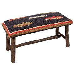 a bench made out of wood with an upholstered seat and colorful rug on it