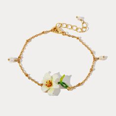 Gold Enamel Flower Jewelry, Adjustable Gold Enamel Bracelets, Gold Flower-shaped Enamel Jewelry, White Enamel Bracelet Jewelry, Elegant Enamel Bangle Bracelets, Elegant Adjustable Enamel Jewelry, Gold Enamel Bangle Bracelets, Gold Enamel Bangle Bracelet, Elegant Gold-tone Enamel Jewelry