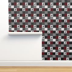 a wall with a black and red checkered pattern on it