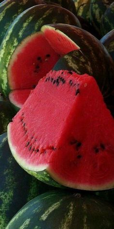 several pieces of watermelon sitting on top of each other