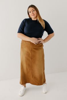 A well-loved denim skirt now in camel! Simple lines, classic, and comfortable, the 'Sara' is everything a denim skirt should be! This timeless long denim skirt is made from a stretch denim material that falls straight from the hips to ensure a modest and flattering fit. Featuring a wide waistband for extra comfort and ease of styling. Wear the 'Sara' comfortably from day to night with your favorite cozy sweater or a simple tee! 97% Cotton 3% Spandex Machine Wash Cold Do Not Bleach Hang to Dry Lo Relaxed Denim Skirt For Workwear In Fall, Everyday Fall Lined Skirt, Fall Workwear Skirt In Medium Wash, Lined Denim Skirt For Workwear In Fall, Fall Workwear Medium Wash Skirt, Fall Workwear Denim Skirt With Lining, Fall Workwear Lined Denim Skirt, Modest Fitted Bottoms For Fall, Fitted Denim Midi Skirt For Fall