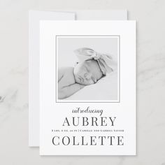 the birth announcement card features an image of a baby's head